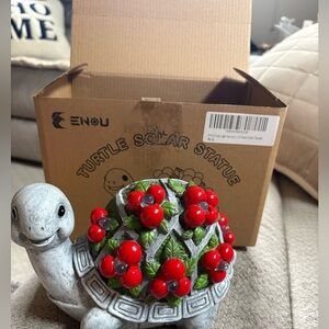 Solar powered turtle statue